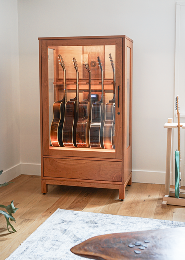 Multi-guitar storage withhumidification and dehumidification controls