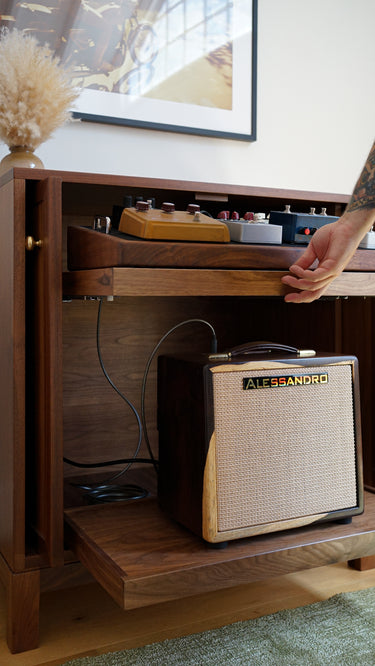 alessandro high-end products amplifier and guitar pedals in a custom gear storage cabinet from american music furniture
