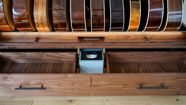 close up of climate controlled guitar cabinet humidifier 